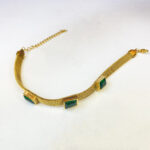 Bracelet maille doré en acier inoxydable avec pierres vertes